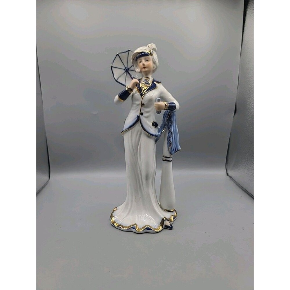 Vintage KPM Blue and White Gold Trim Woman Umbrella Porcelain Figurine